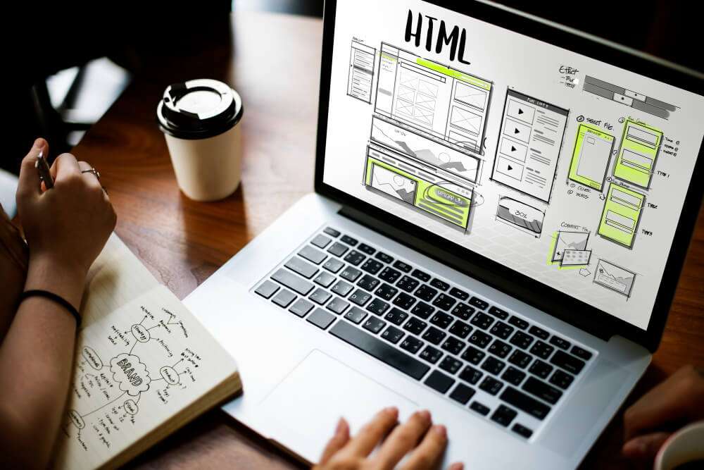 laptop with web design services for small business