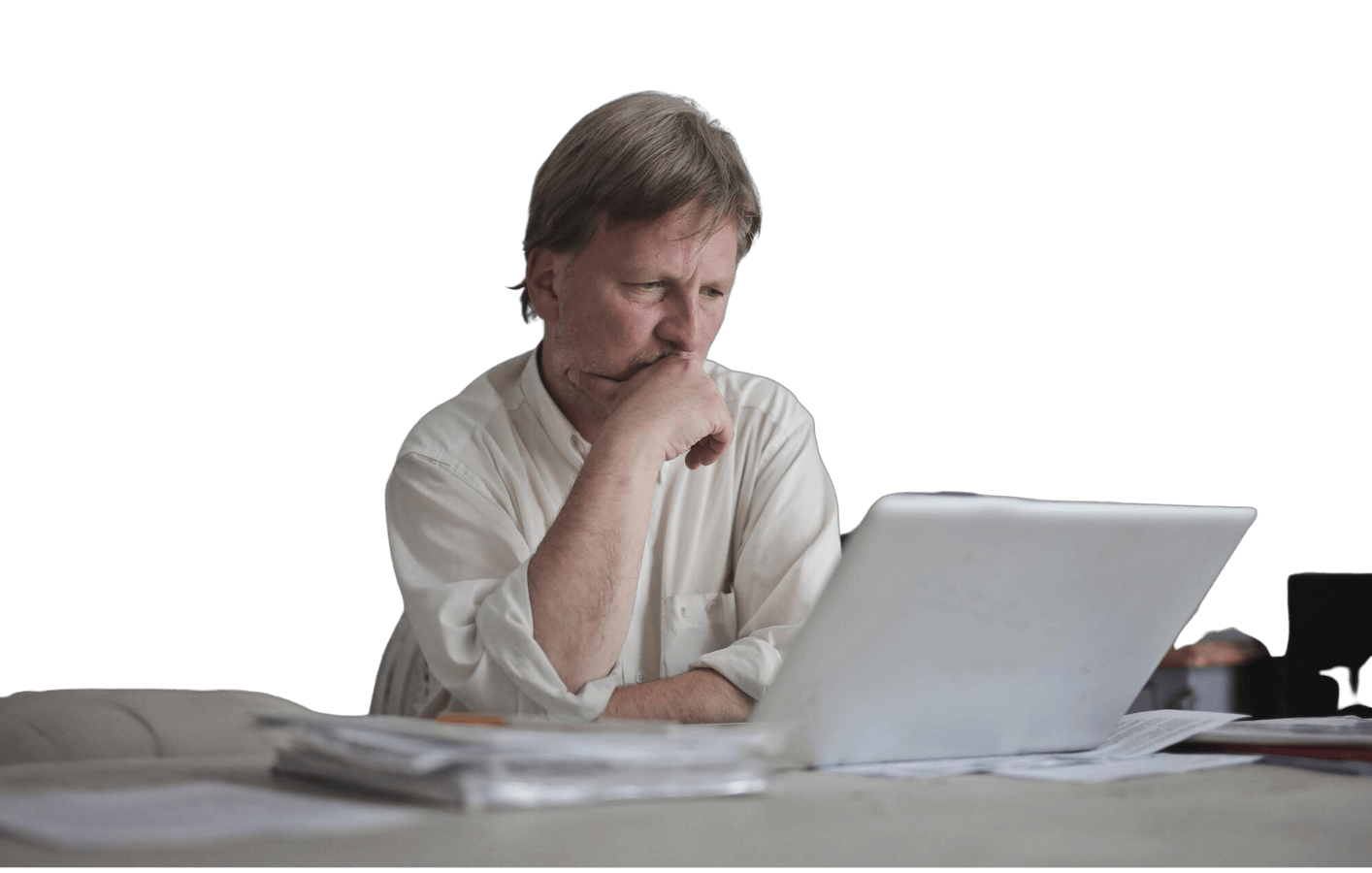 Man looking at laptop concerned website isn't working